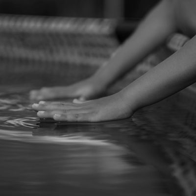 Abstract close-up of a person's hands in a graceful motion.
